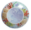 Plato hondo de melamina de la colección Oceano, con un diseño que evoca las olas del mar en tonos azules y blancos.