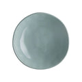 Plato hondo de gres en color agua, colección Sinfonia, con un diseño moderno italiano.