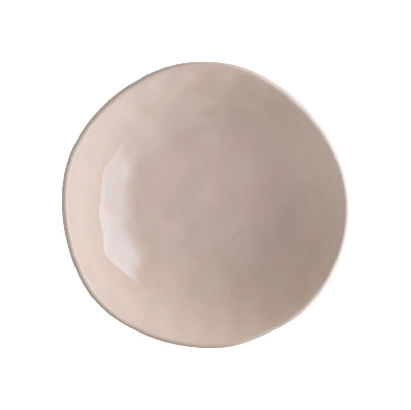Plato hondo de gres color marfil, colección Sinfonia de Brandani.