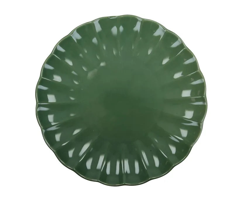 Plato llano Calipso en color menta, con un diseño moderno y acabado cuidado.