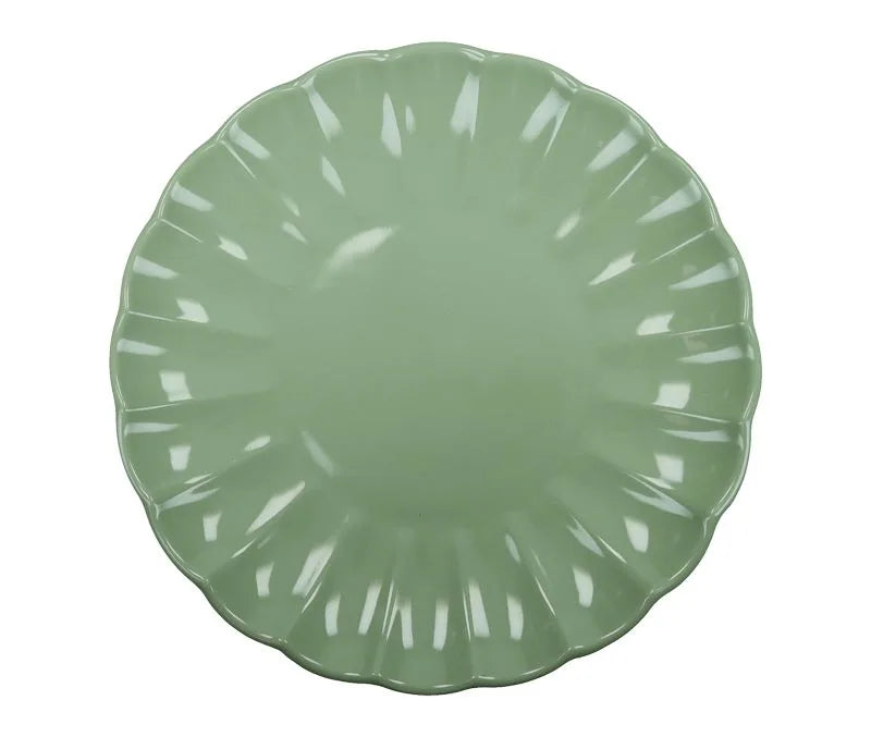 Plato llano verde de la colección Calipso, presentado sobre fondo blanco.