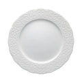 Plato llano "Gran Gala" de porcelana blanca con borde sutilmente realzado, presentado sobre fondo neutro.