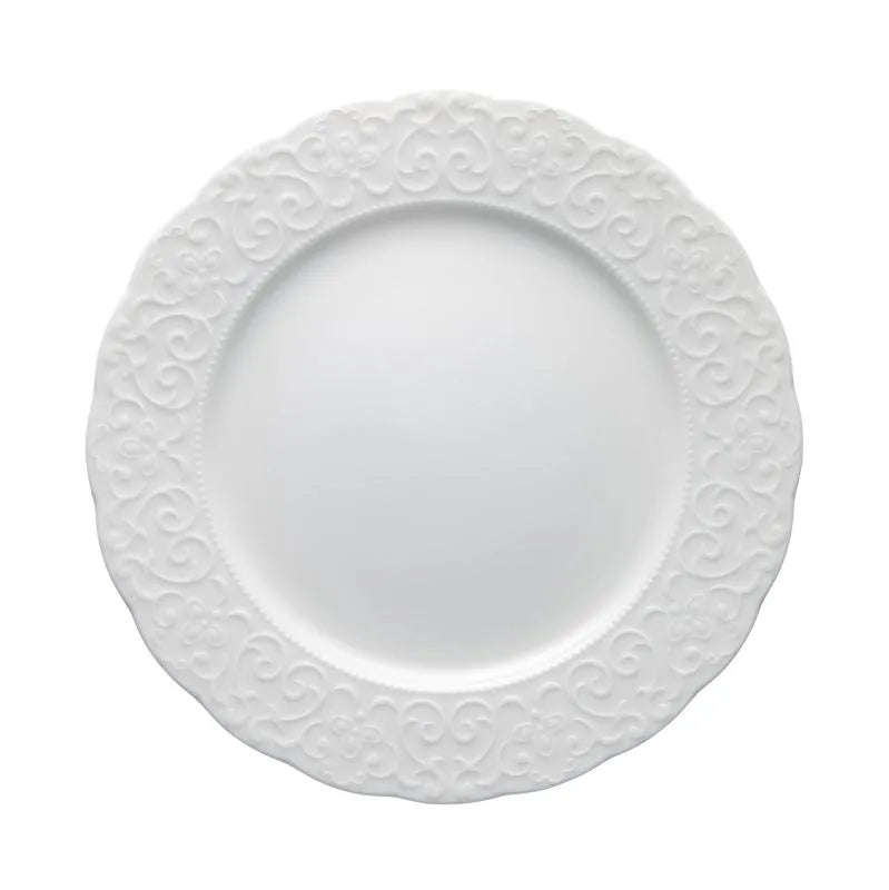 Plato llano "Gran Gala" de porcelana blanca con borde sutilmente realzado, presentado sobre fondo neutro.
