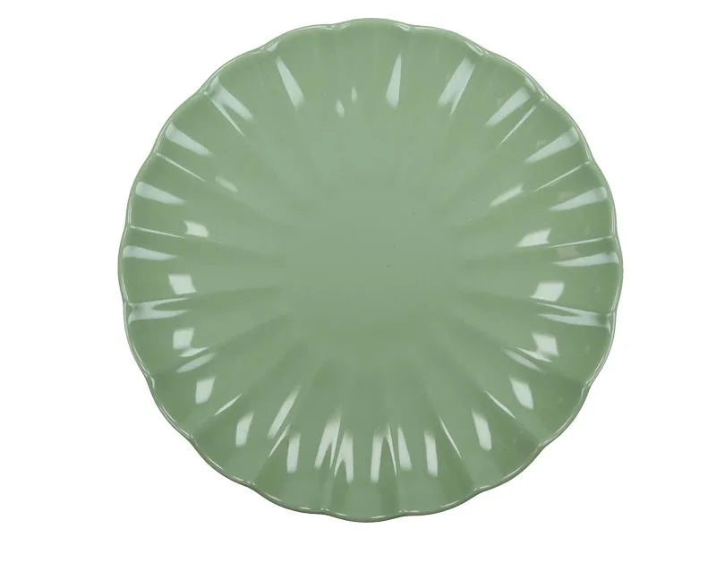 Plato de postre redondo de cerámica en color verde intenso, modelo Calipso.