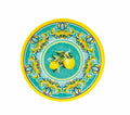 Plato de postre Citrus de melamina con diseño de limones y hojas sobre fondo blanco.