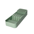 Portacuchillos de cocina de color verde, con un diseño moderno y funcional, ideal para mantener los utensilios organizados.