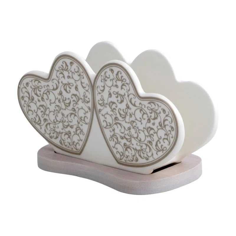 Portaservilletas "Rizos de Hada" de porcelana blanca y base de bambú natural con textura de rizos.