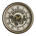 Reloj Happy Gear de Brandani con mecanismo a la vista, estructura metálica, sobre un fondo neutro.