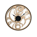 Reloj de pared Brandani con esfera de metal y detalles en madera natural, diseño moderno italiano.