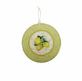 Salvamanteles redondo de cerámica con diseño de limones sobre base de corcho, de Brandani Gift Group.