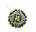 Salvamanteles redondo de cerámica azul con borde texturizado, centro de corcho y diseño Citrus.