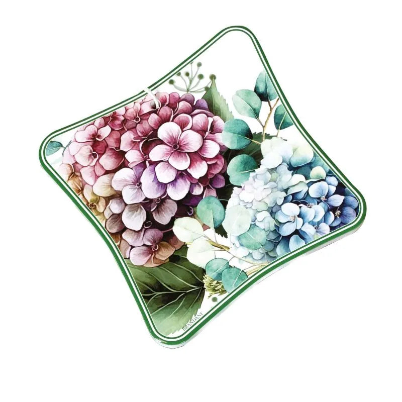 Salvamanteles Flora de Brandani, fabricado en cerámica y corcho, con un diseño floral.