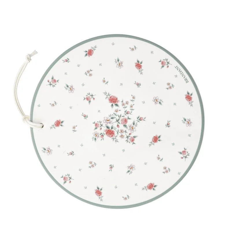 Salvamanteles de cerámica rosa de la colección Nonna Rosa de Brandani Gift Group.