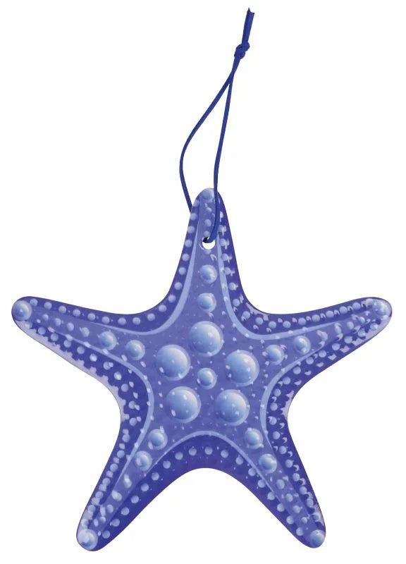 Salvamanteles Stella Marina Coral, fabricado en cerámica y corcho con un diseño inspirado en una estrella de mar en tono.