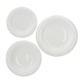 Set de 18 Piezas Optical de Brandani, compuesto por platos y cuencos de diseño moderno.