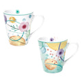 Set de 2 tazas "Bollicine" de cerámica blanca con detalles sutiles, presentadas juntas.