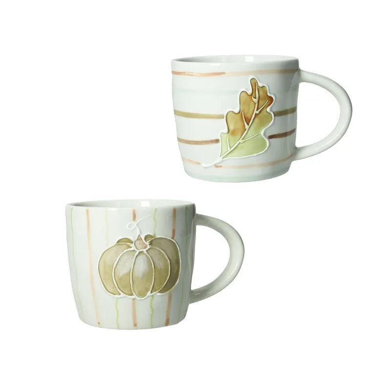 Set de 2 tazas con diseño de calabaza y hoja, acabado mate.