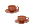 Set de 2 tazas de café Calipso en color coral, con un diseño moderno y elegante.