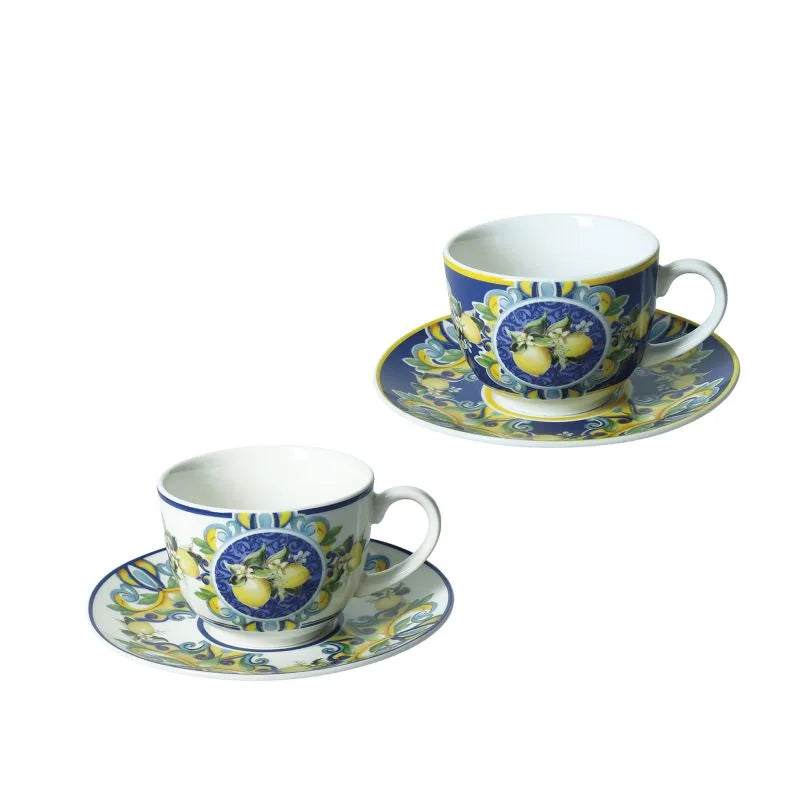 Set de 2 tazas de café Citrus Blu, con diseño de cítricos en color azul sobre cerámica blanca.