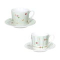 Set de dos tazas de café Brandani Polline en New Bone China color verde, con platillos a juego, sobre fondo neutro.