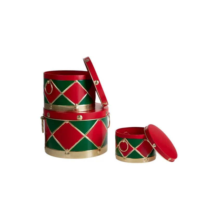 Set de 3 cajas tambor decorativas navideñas, apiladas y mostrando su diseño festivo.