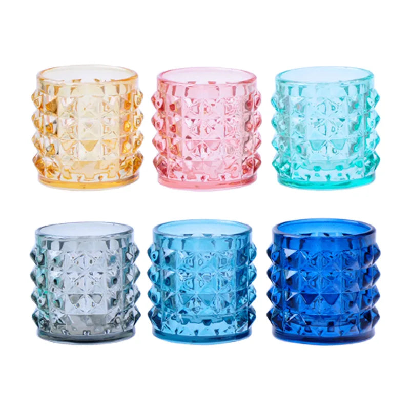 Set de 6 chupitos de cristal con diseño Funky en colores surtidos, presentados sobre una superficie neutra.