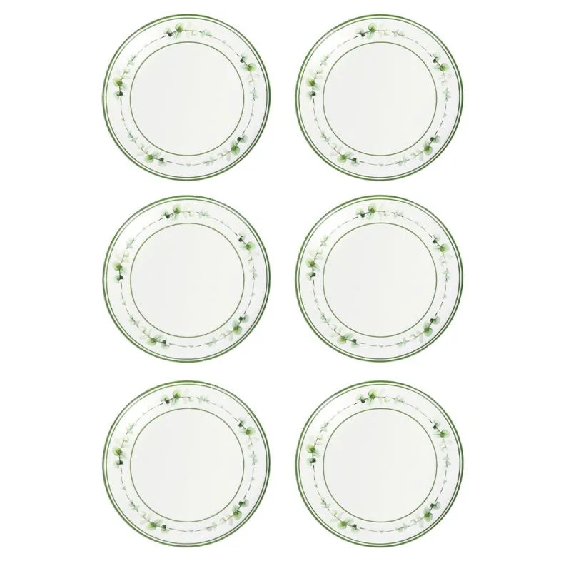 Set de 6 platos de pan y postre de porcelana New Bone China, presentados sobre una superficie neutra.