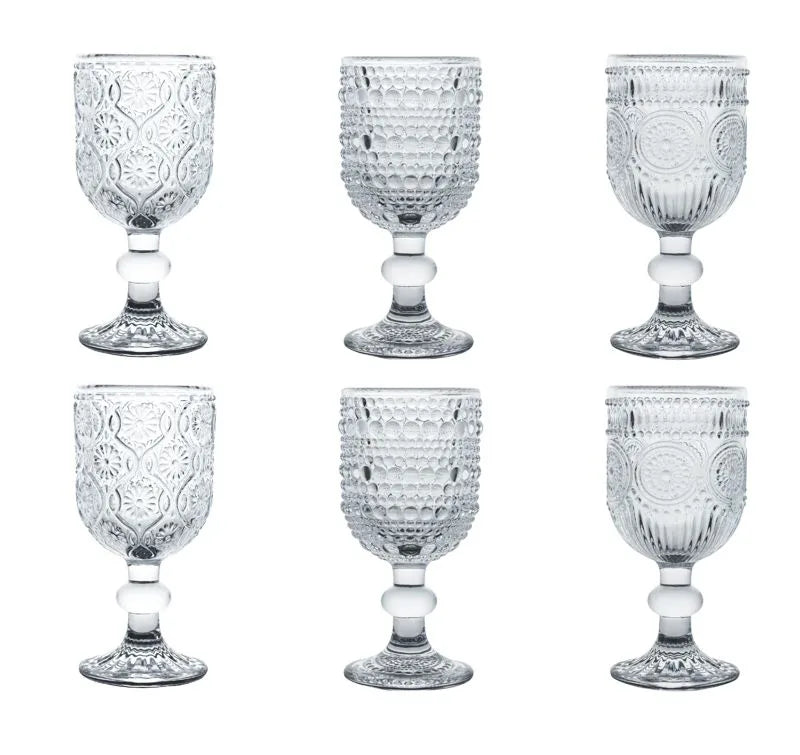 Set de 6 vasos de licor Indie de cristal transparente con base decorativa.