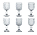 Set de 6 vasos de licor Indie de cristal transparente con base decorativa.