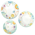 Set de mesa 18 piezas Bollicine Brandani, mostrando platos y cuencos con diseño burbuja.