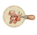 Tabla de cortar redonda Coccole, con diseño navideño y detalles que evocan la tradición italiana.
