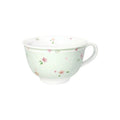 Taza de desayuno Brandani de porcelana en color verde, colección Polline, vista frontal.