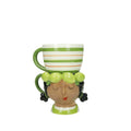 Taza doble Lady Lime de cerámica con diseño floral en tonos verdes y blancos.