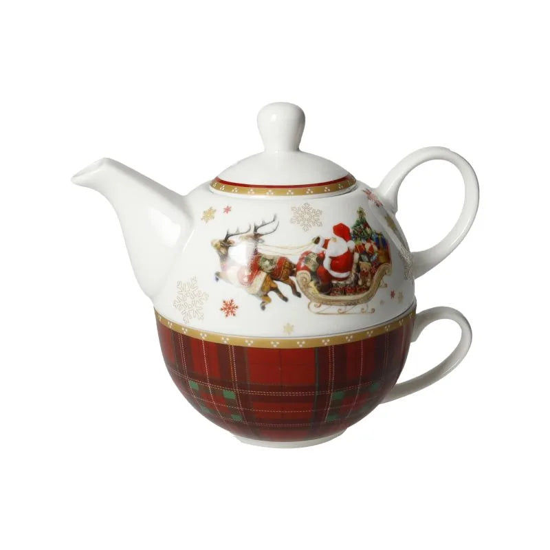 Tetera y taza a juego con diseño navideño, fabricadas en porcelana New Bone China.
