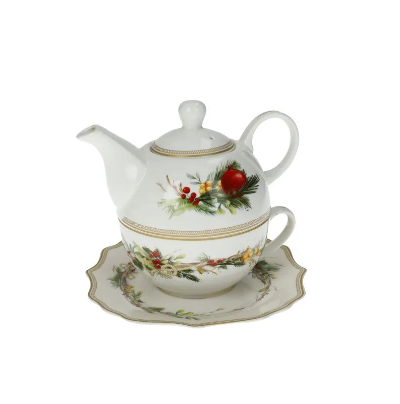 Tetera blanca modelo Carol de Brandani, con su taza y plato a juego, presentada sobre una superficie neutra.