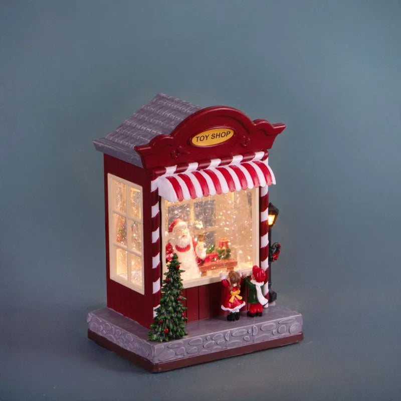 Tienda de Juguetes Navideña con luces LED y música, dimensiones 16x12x22 cm.